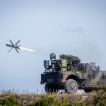 Military vehicle launching a spike nlos non-line-of -sight EO missile